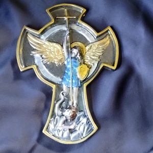 Arch angel defeating the devil